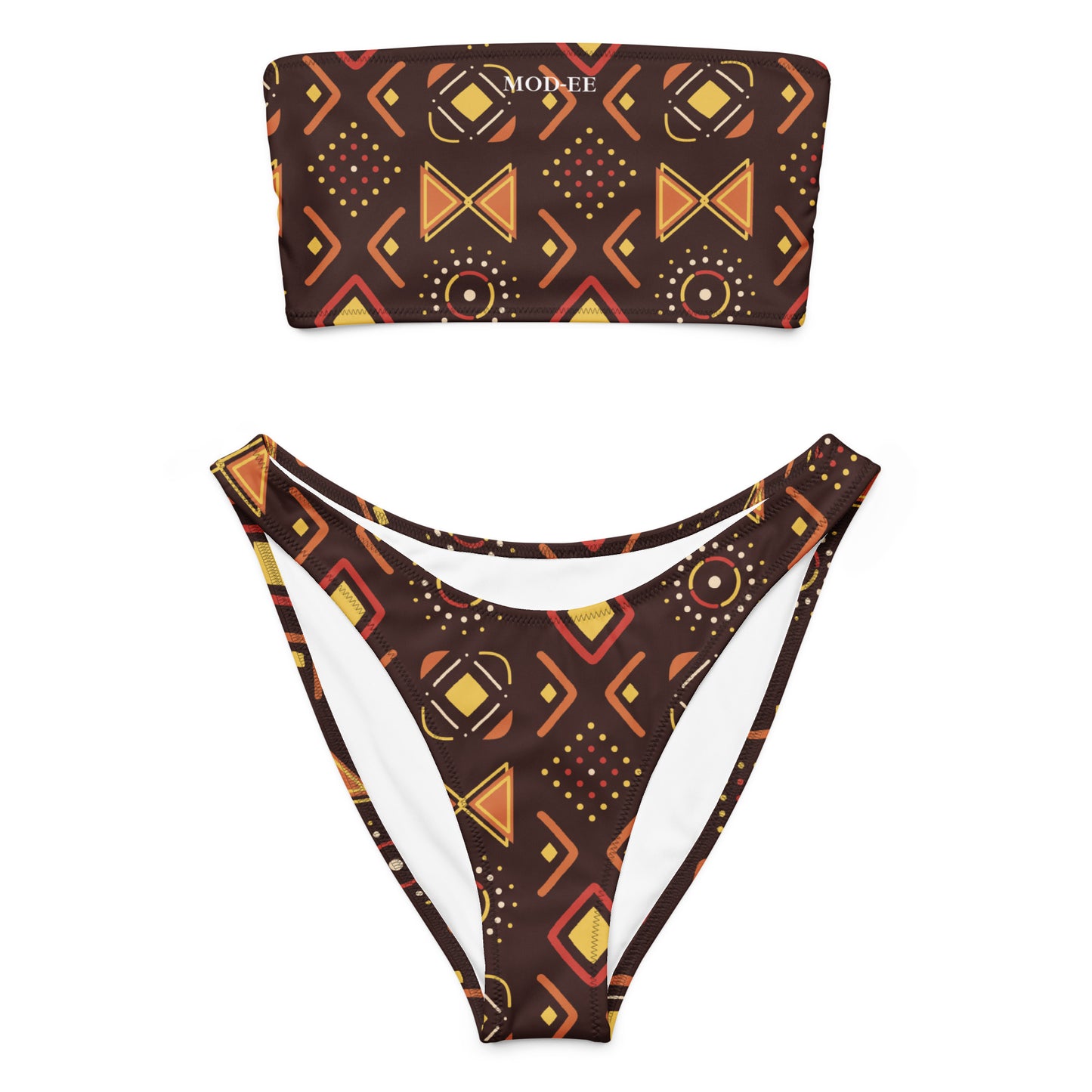 Adoptez un look à la fois élégant, moderne et écoresponsable avec ce bikini bandeau imprimé wax conçu pour sublimer toutes les silhouettes. Que ce soit pour une journée à la plage, un moment détente au bord de la piscine ou pour profiter du soleil en toute liberté, ce maillot est votre allié idéal.