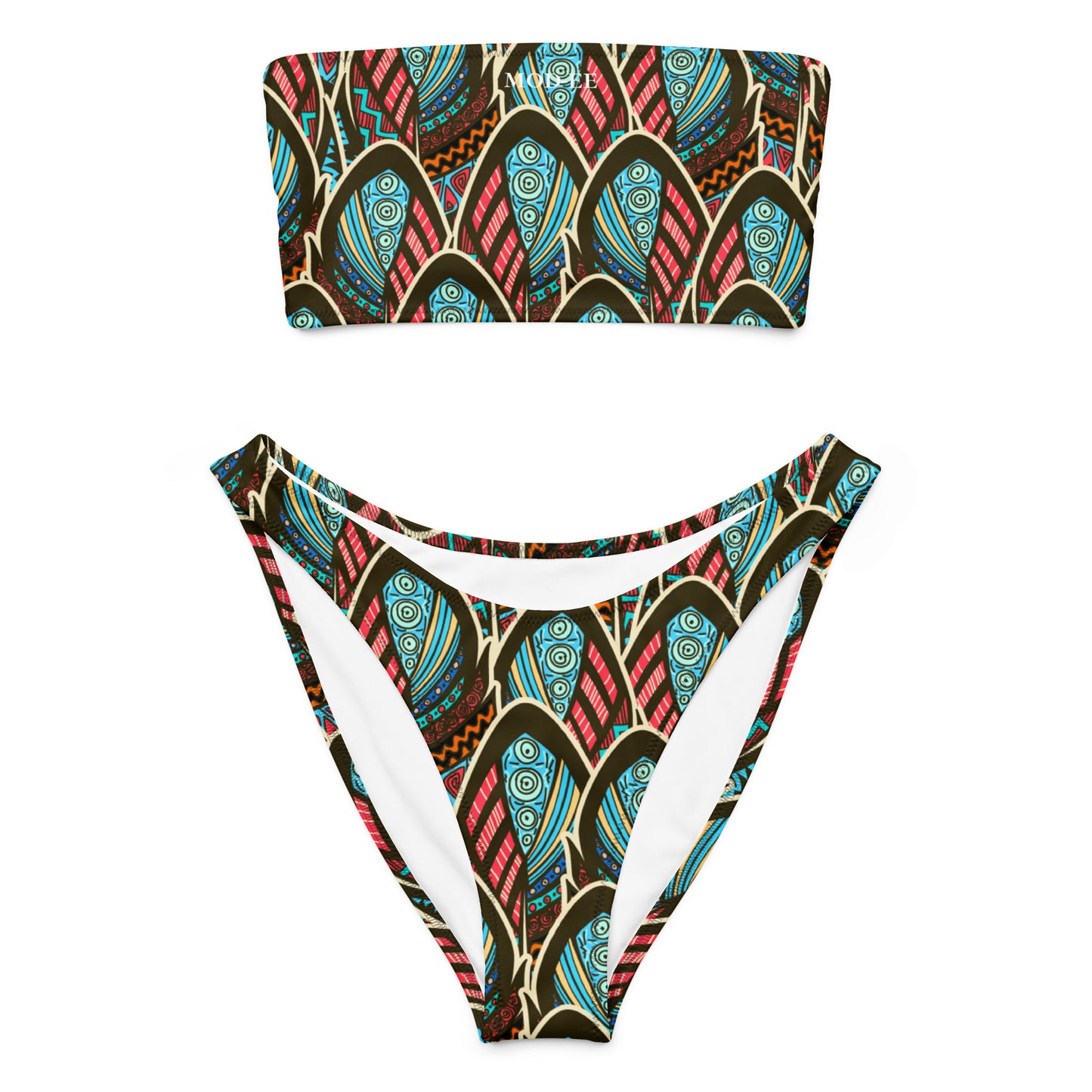 Adoptez un look à la fois élégant, moderne et écoresponsable avec ce bikini bandeau imprimé wax conçu pour sublimer toutes les silhouettes. Que ce soit pour une journée à la plage, un moment détente au bord de la piscine ou pour profiter du soleil en toute liberté, ce maillot est votre allié idéal.
