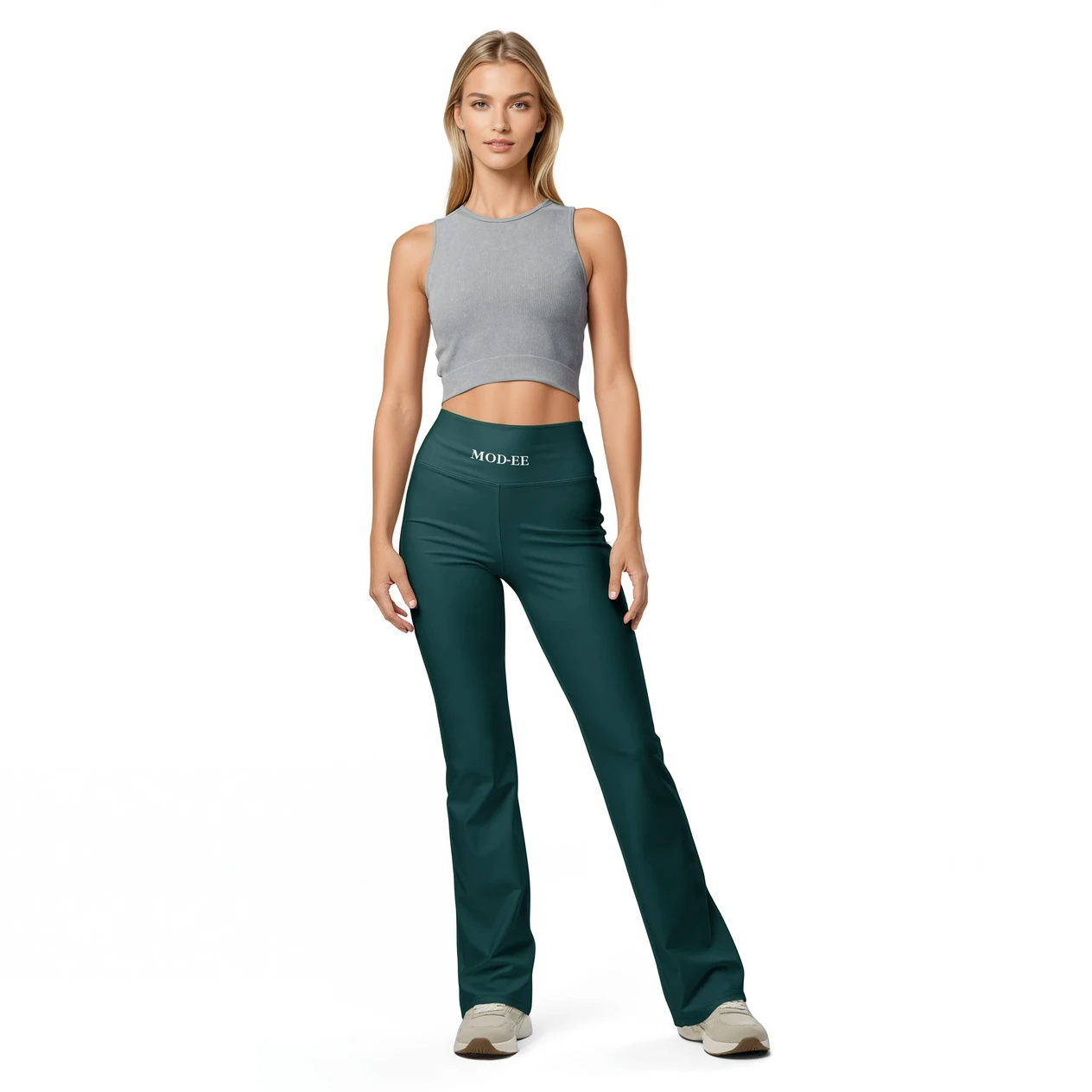 Legging évasé vert Mod-ee, une taille haute et un tissu doux, doté d'une protection UPF 50+ et conçu pour une évacuation efficace de l'humidité, idéal pour une pratique sportive dans un confort optimal.