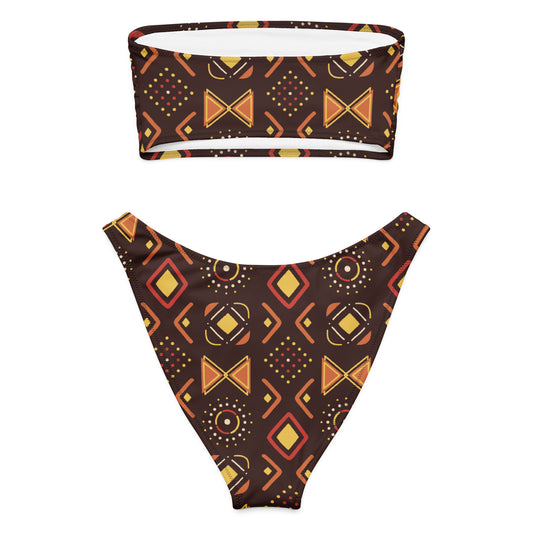Adoptez un look à la fois élégant, moderne et écoresponsable avec ce bikini bandeau imprimé wax conçu pour sublimer toutes les silhouettes. Que ce soit pour une journée à la plage, un moment détente au bord de la piscine ou pour profiter du soleil en toute liberté, ce maillot est votre allié idéal.
