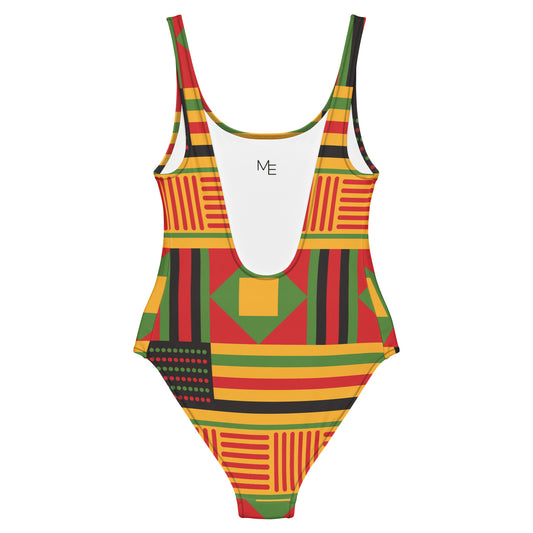 Maillot de bain imprimé wax une pièce Mod-ee, présentant une coupe ajustée et un dos plongeant, réalisé dans un matériau extensible pour un maintien optimal et un confort raffiné lors de vos activités aquatiques.