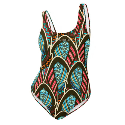 Maillot de bain imprimé wax une pièce Mod-ee, présentant une coupe ajustée et un dos plongeant, réalisé dans un matériau extensible pour un maintien optimal et un confort raffiné lors de vos activités aquatiques.
