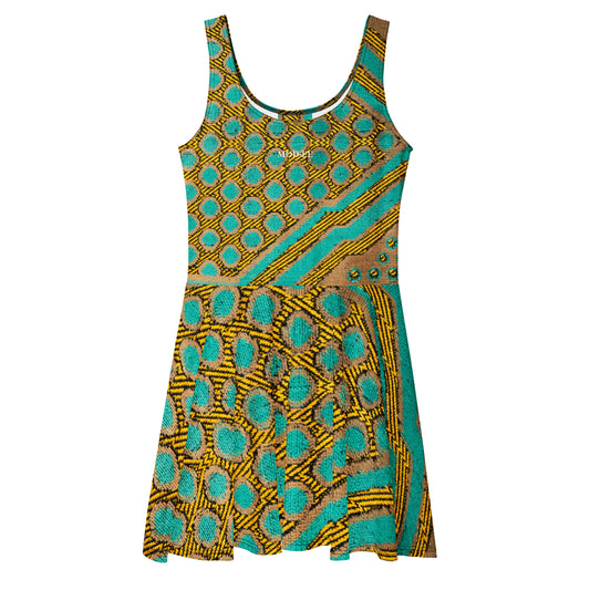 Sublimez votre garde-robe avec cette élégante robe patineuse sans manches en imprimé wax africain. Confectionnée dans un coton doux et respirant, elle offre un confort optimal tout au long de la journée.