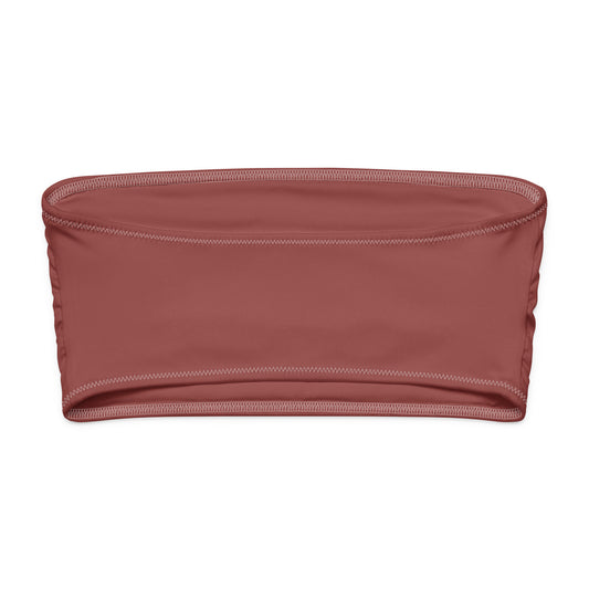 Ce bandeau doux, extensible et entièrement doublé offre un confort optimal et une protection solaire UPF 50+. À porter comme haut de maillot de bain ou top d’été stylé, il s’adapte à toutes vos envies : plage, ville ou soirée.