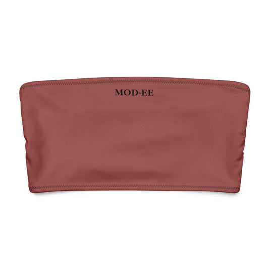 Ce bandeau doux, extensible et entièrement doublé offre un confort optimal et une protection solaire UPF 50+. À porter comme haut de maillot de bain ou top d’été stylé, il s’adapte à toutes vos envies : plage, ville ou soirée.
