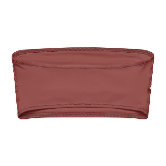 Ce bandeau doux, extensible et entièrement doublé offre un confort optimal et une protection solaire UPF 50+. À porter comme haut de maillot de bain ou top d’été stylé, il s’adapte à toutes vos envies : plage, ville ou soirée.