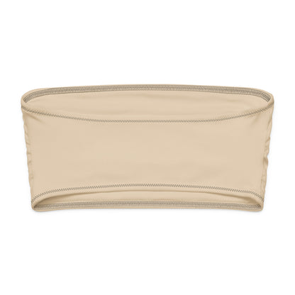 Ce bandeau doux, extensible et entièrement doublé offre un confort optimal et une protection solaire UPF 50+. À porter comme haut de maillot de bain ou top d’été stylé, il s’adapte à toutes vos envies : plage, ville ou soirée.
